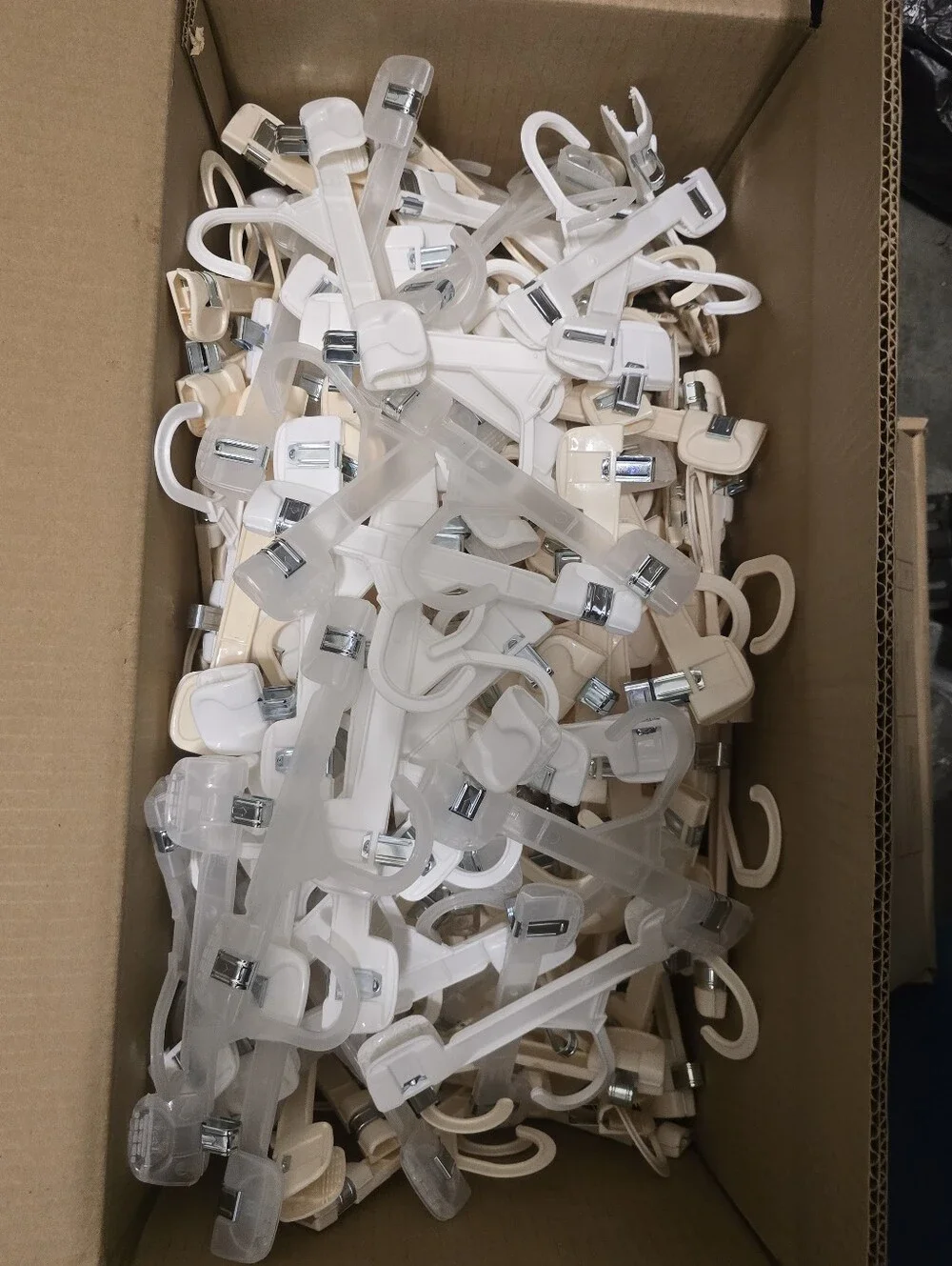 Clear and Beige Clip Hangers